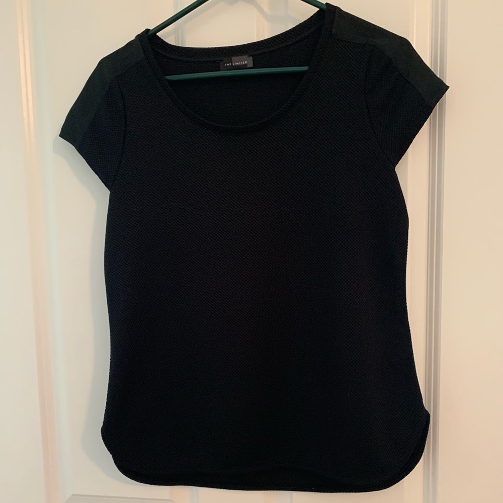 The limited black blouse